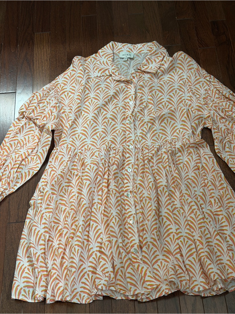 Aura Peach and Cream Printed Button-Front Peplum Top